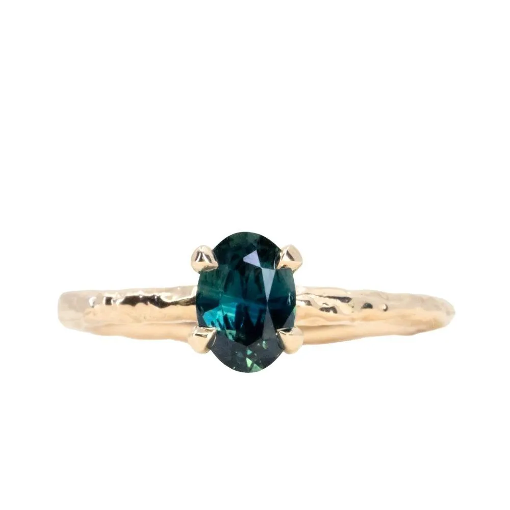 0.72ct Oval Untreated Nigerian Sapphire Evergreen Carved Solitaire in 14k Yellow Gold