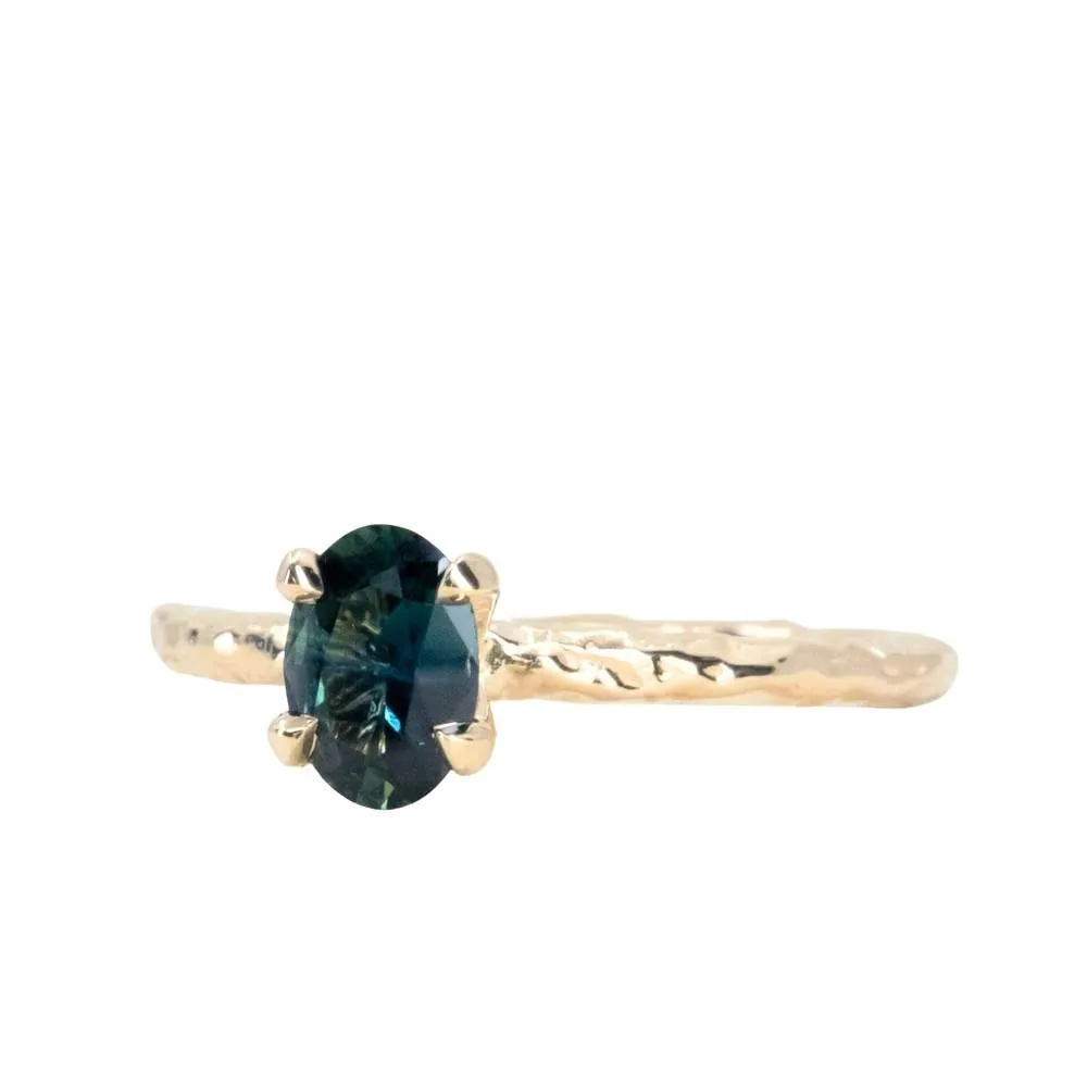 0.72ct Oval Untreated Nigerian Sapphire Evergreen Carved Solitaire in 14k Yellow Gold